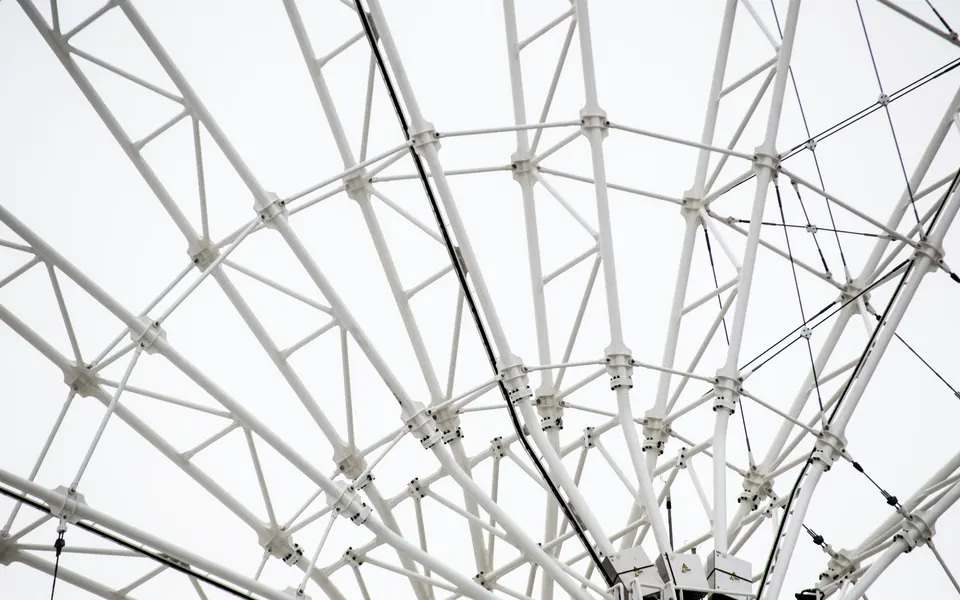 A white steel framework of interconnected beams and joints